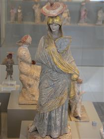 Statue of a Woman with Blue and Gilt Garment, Fan and Sun Hat, from Tanagra - Ancient Greek Painting and Sculpture