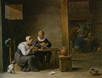 A man and woman smoking a pipe seated in an interior with peasants playing cards on a table - David Teniers the Younger