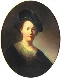 Brustbild einer jungen Frau mit einem gefiederten Barrett - Rembrandt van Rijn